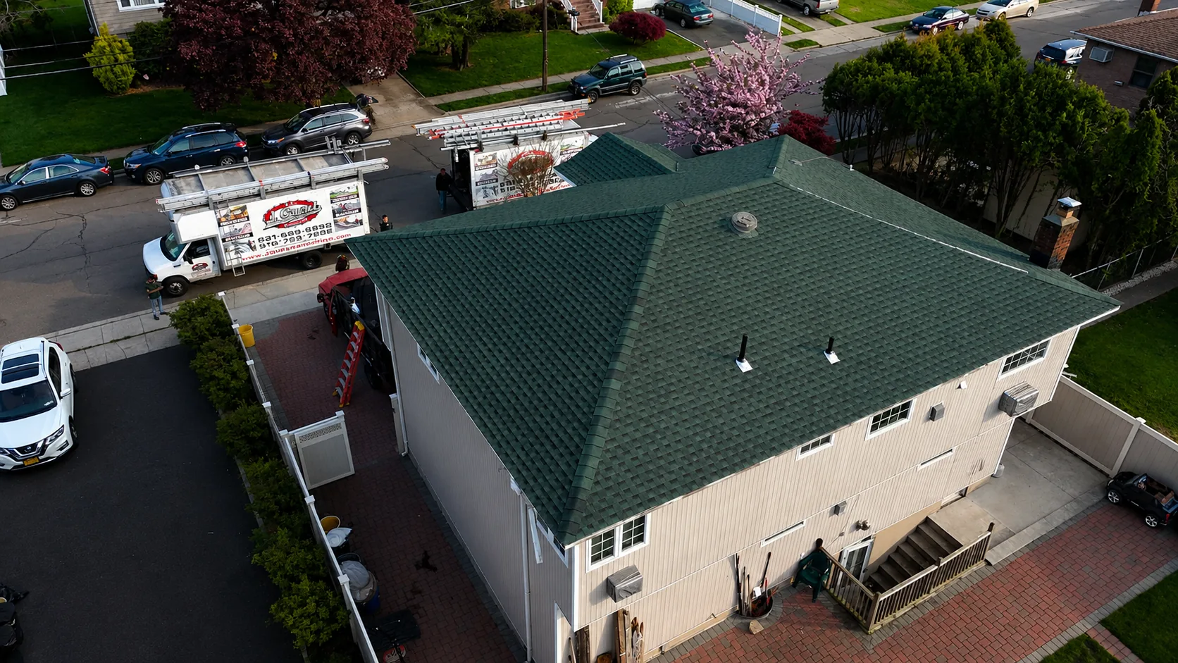 Roof inspection documenting storm damage for an insurance claim in Lindenhurst